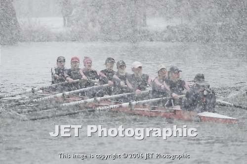 Caroline rowing in a Pembroke 8 in a blizzard.